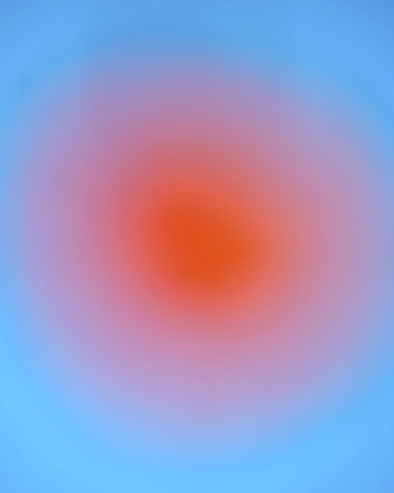 Punto naranja sobre fondo azul